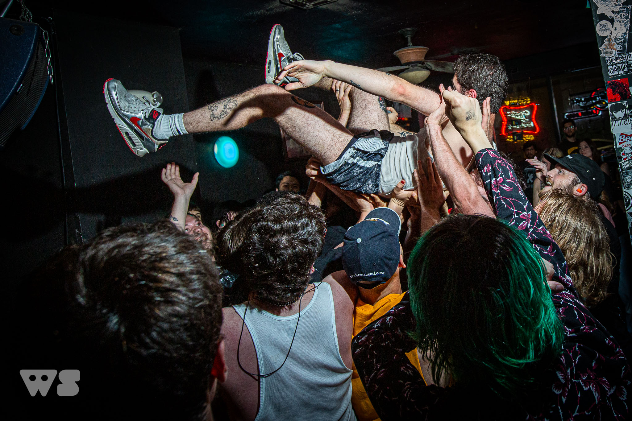 A man crowd surfs at the lip critic show